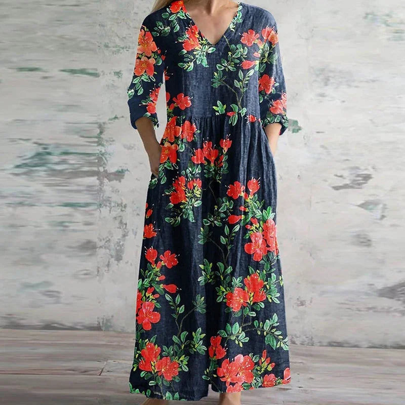 Sukienka maxi z detalami patchwork, kolorowe panele kwiatowe i geometryczne, rękawy do łokcia, letni styl casual