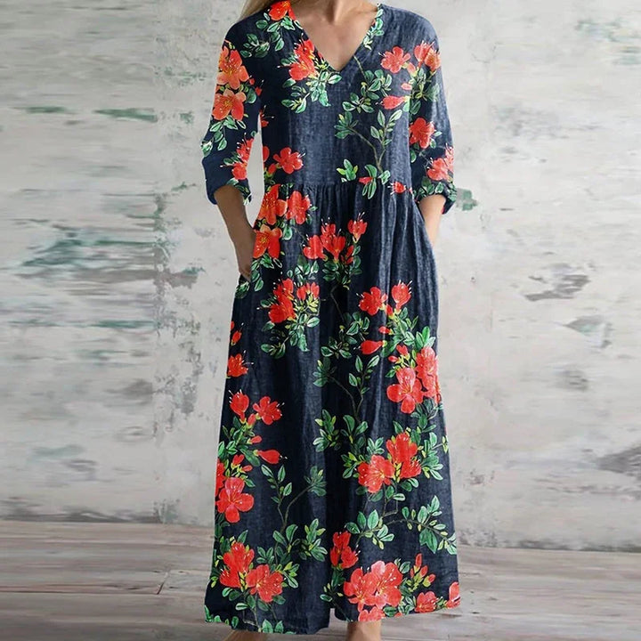 Sukienka maxi z detalami patchwork, kolorowe panele kwiatowe i geometryczne, rękawy do łokcia, letni styl casual
